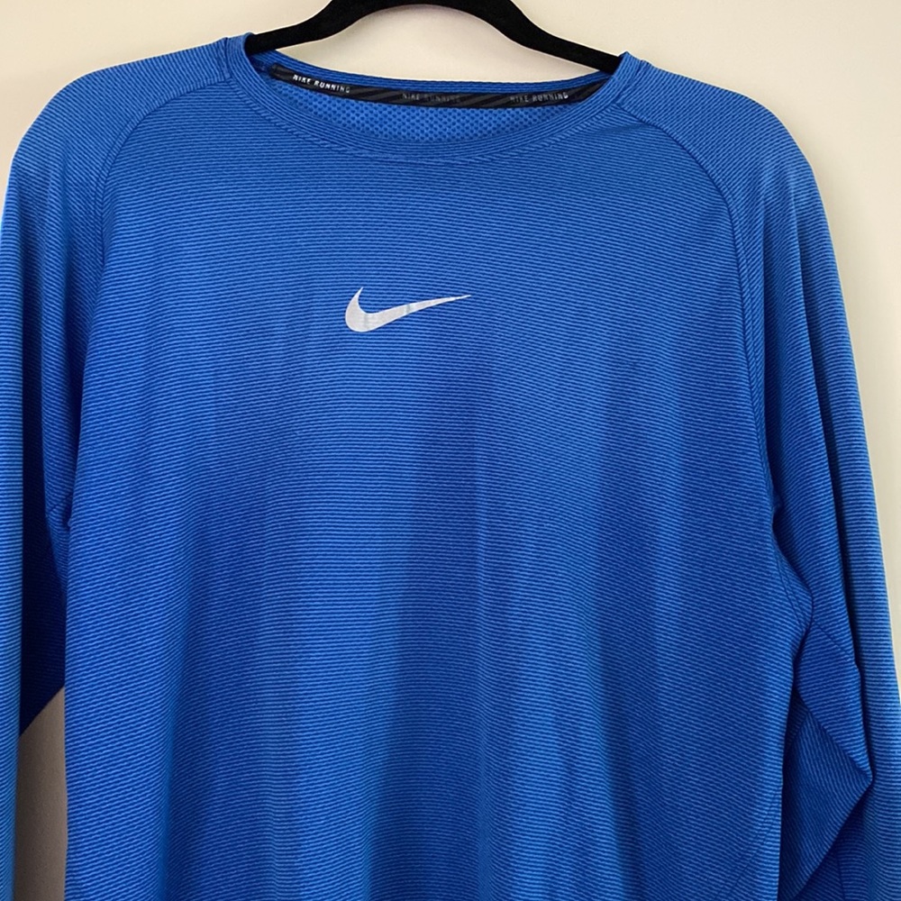 Menswear Nike Dri-fit  athletic runners lightweight shirt.